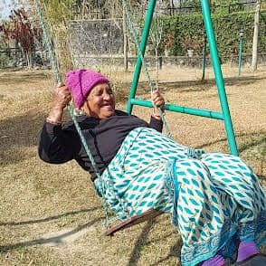Resident Enjoying Swing
